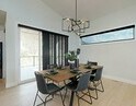 Dining room in a home by Carrington Homes in Lone Pine Estates in Kelowna, British Columbia. 